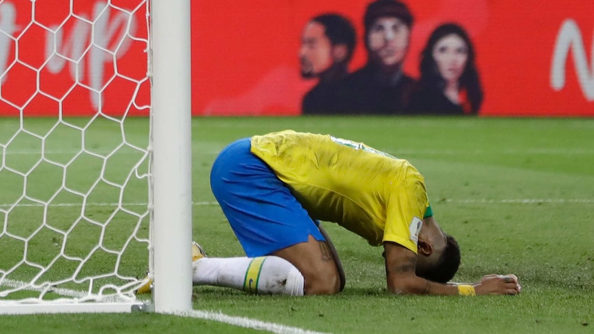 Neymar puts his head to the ground after missing scoring chance