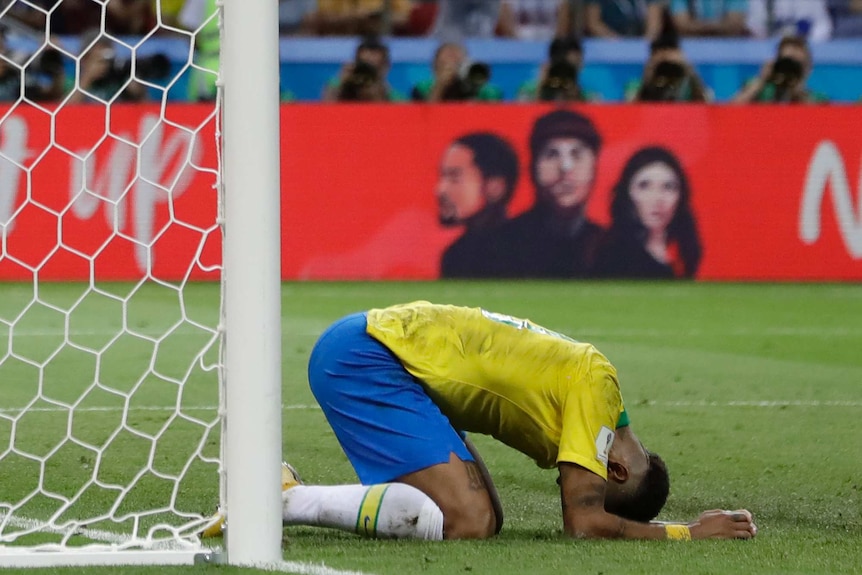 Neymar puts his head to the ground after missing scoring chance