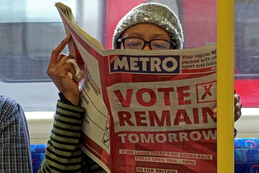 Brexit - woman with newspaper