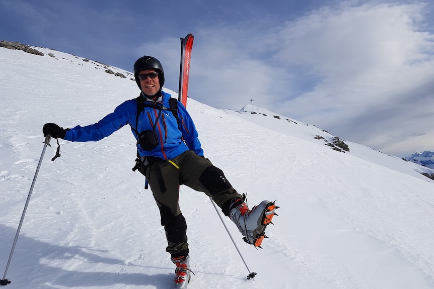 A picture of alpinist Dr Hannes Vogelmann with skis and ice-climbing shows
