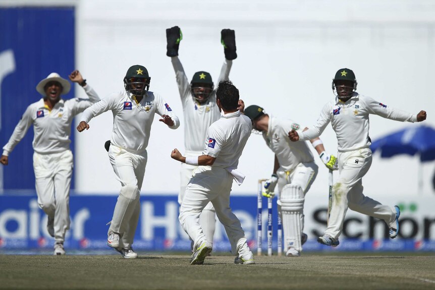 Zulfiqar Babar and Pakistan celebrate the wicket of Steve Smith