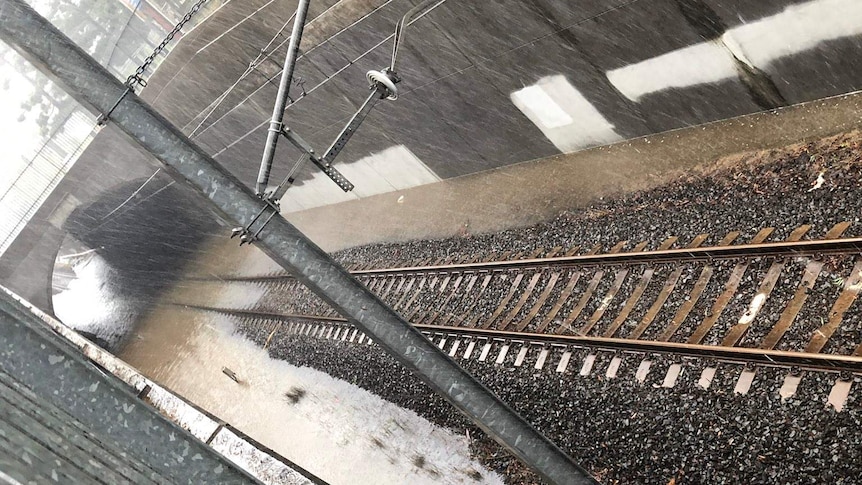 a train track submerged in water