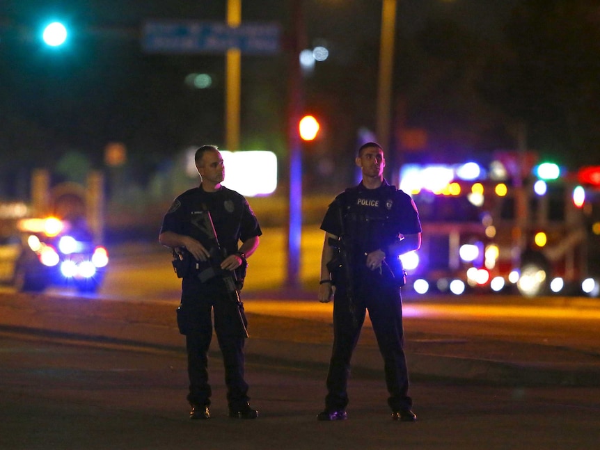 Police officers block intersection after shooting at the Muhammad Art Exhibit and Contest in Texas