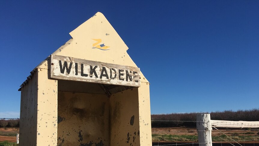 A sign across from the historic Wilkadene Station