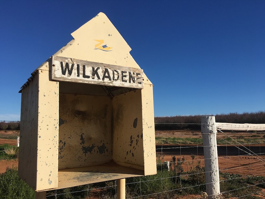 A sign across from the historic Wilkadene Station