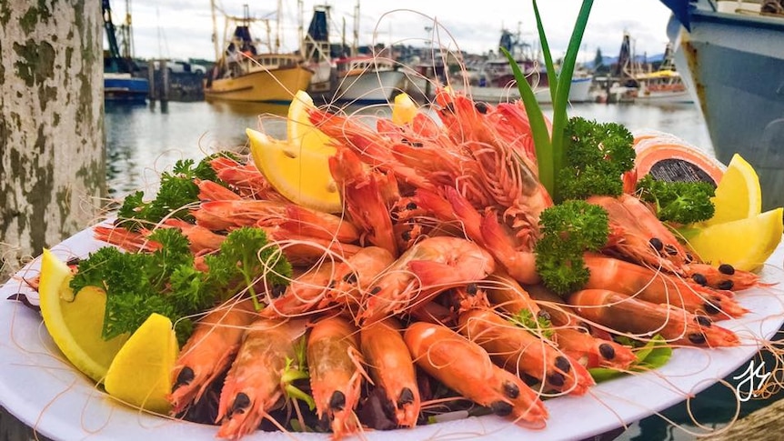 A plate of fresh cooked local prawns.