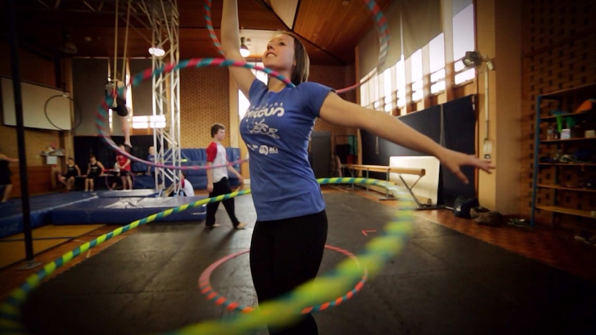 Learning how to hula hoop at the Warehouse Circus is harder than it looks.