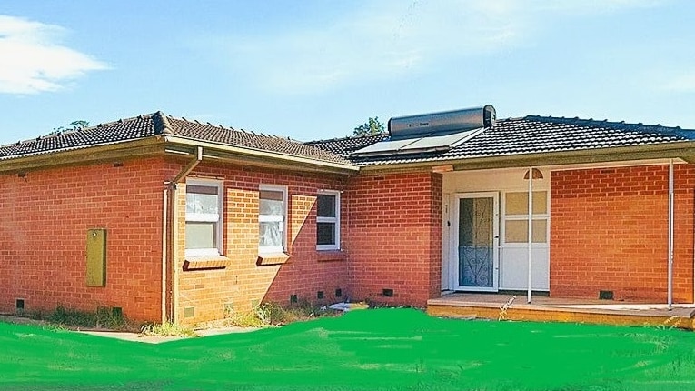 A house with an unnaturally green lawn