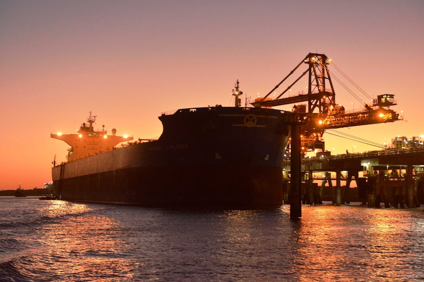 The first shipment of iron ore from Roy Hill being loaded