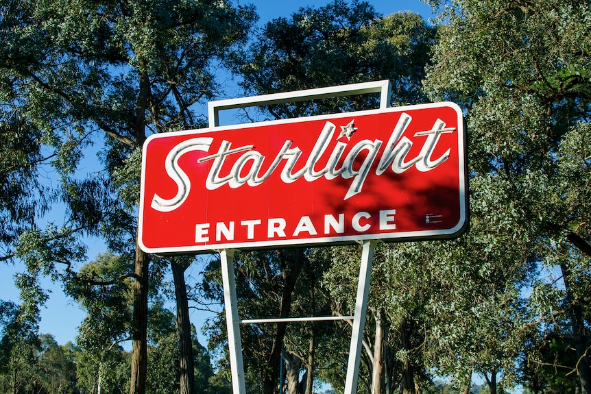 Large sign at entrance of Starlight drive in