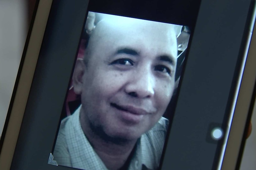 Framed photo of MH370 pilot Zaharie Shah