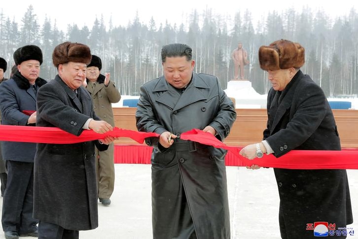 Kim Jong Un during a ribbon cutting ceremony at the township of Samjiyon County.