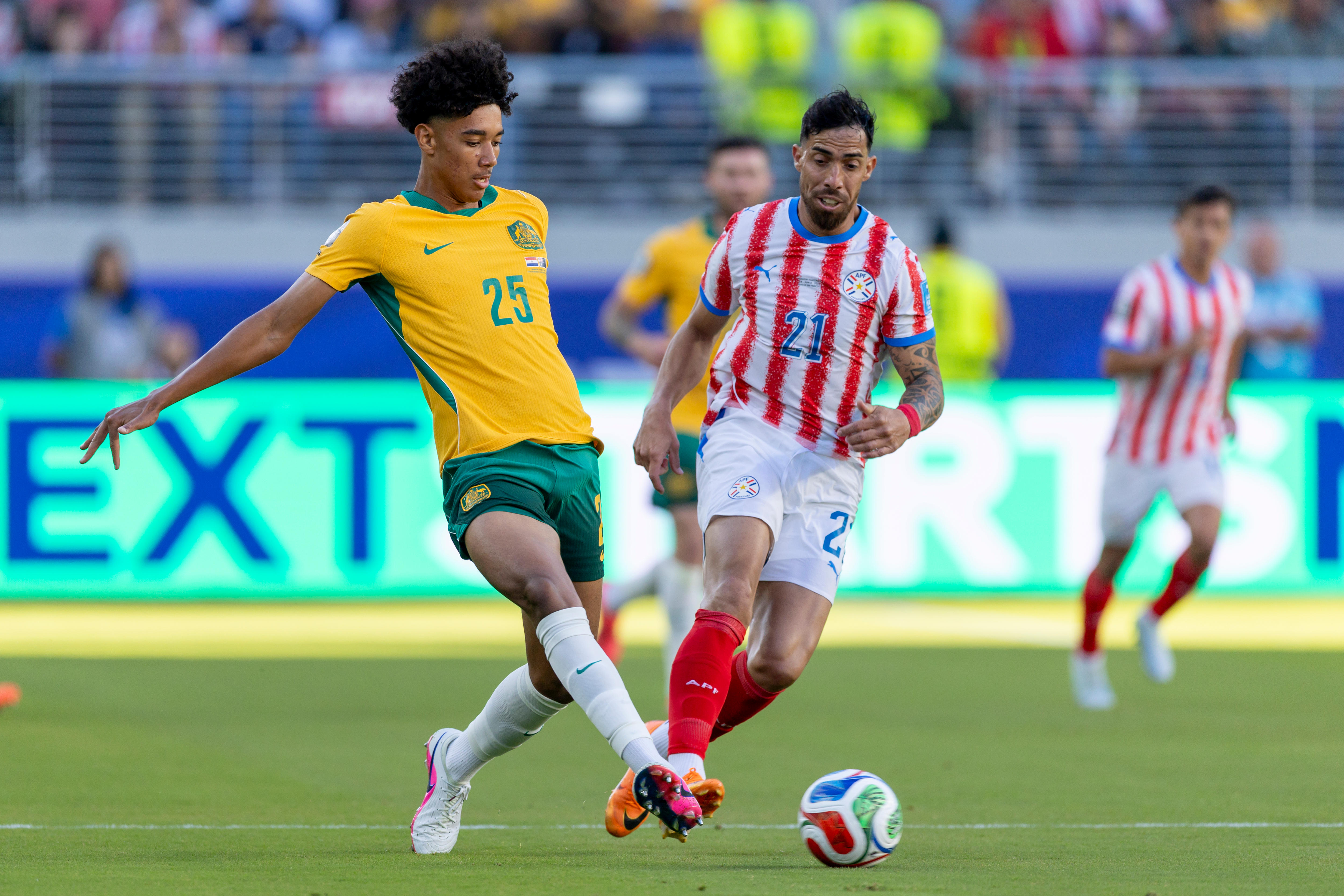 Lucas Herrington #25 of Australia passes the ball