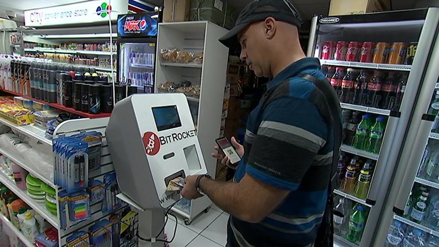 In just ten minutes, the ABC saw five investors feed thousands of dollars into this bitcoin ATM in central Sydney.
