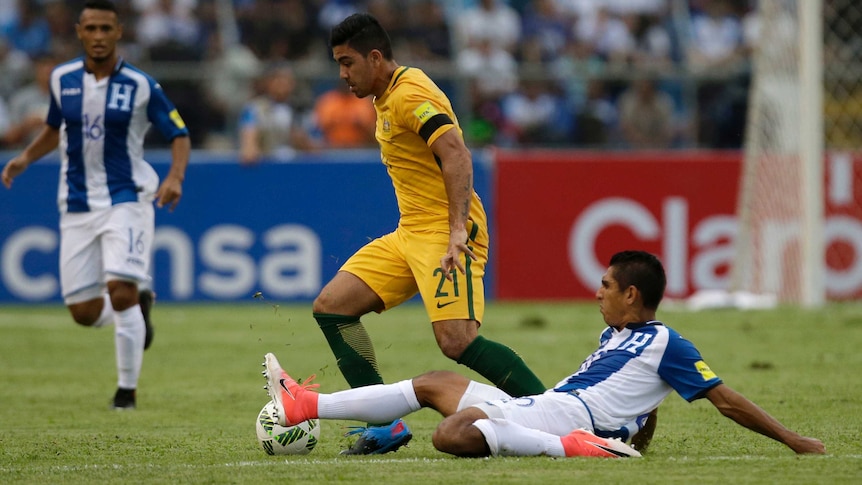 Massimo Luongo on the ball for Australia