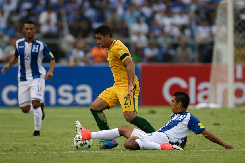 Massimo Luongo on the ball for Australia