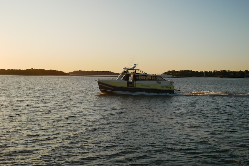 An ambulance boat motoring across the water.