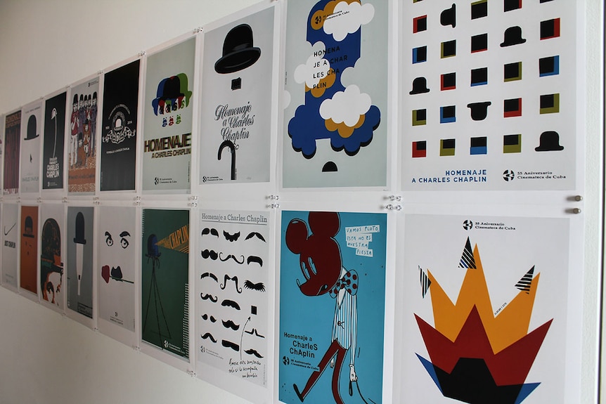 Two rows of Cuban art posters featuring Charlie Chaplin.