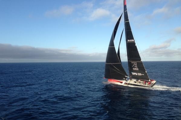 US supermaxi Comanche in the early morning coming down the Tasmanian coast.