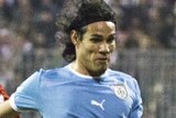 Cavani torments Jordan in intercontinental playoff