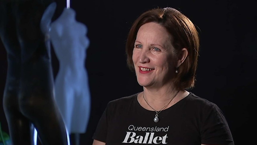 Mary McKendry sitting in the rehearsal space at the Queensland Ballet