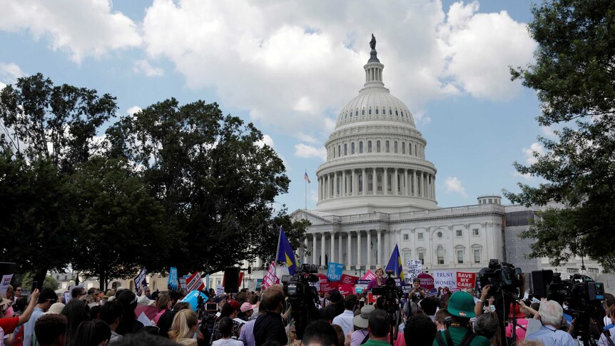 Protestors gather during a demonstration against the Republican repeal of the Affordable Care Act.