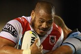 Leeson Ah Mau charges forward for the Dragons