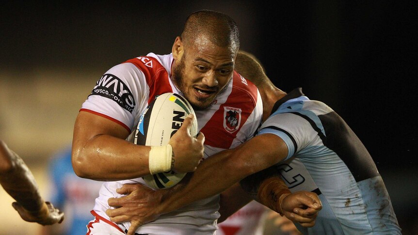 Leeson Ah Mau charges forward for the Dragons
