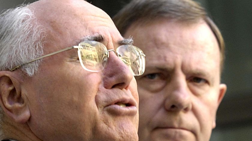 John Howard and Peter Costello are now a team going into a federal election campaign. (File photo)