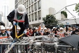 Hong Kong authorities remove barricades in protest sites