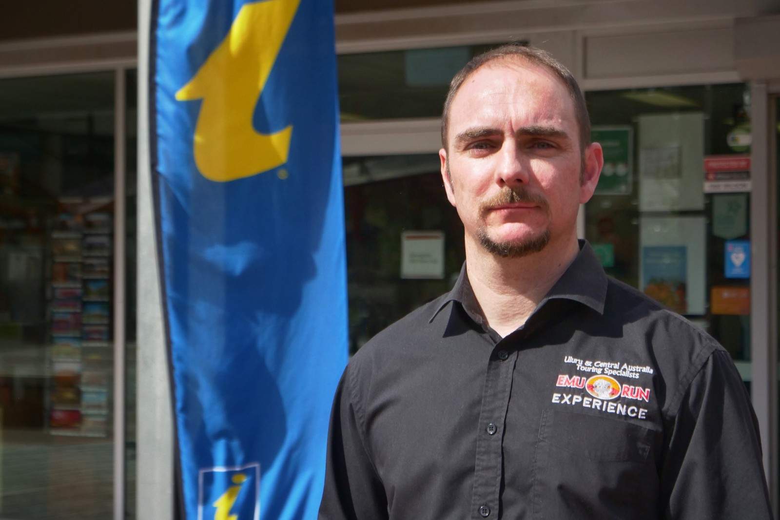 Tourism Central Australia Chair Patrick Bedford standing in full sunlight in the Alice Springs mall.