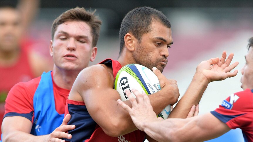 Attack mode ... Karmichael Hunt training with the Reds on Thursday