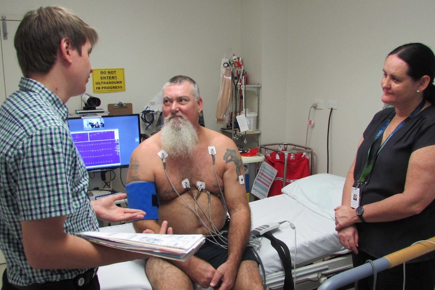 Terrance Pratt gets wired up for a cardiology test which is live video conferenced to medical specialists