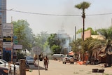 A soldier walks near the rear of the Army Headquarters in central Ouagadougou, Burkina Faso.