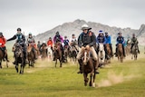 Riders on horseback in the 2016 Mongol Derby