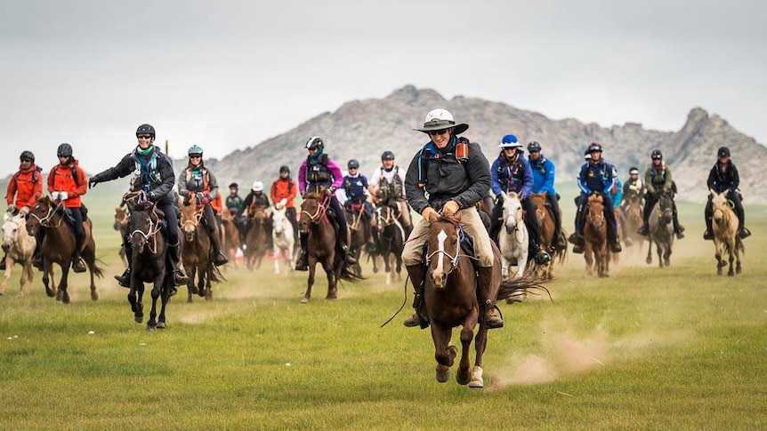 Riders on horseback in the 2016 Mongol Derby