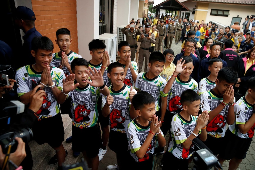 The boys rescued from the cave