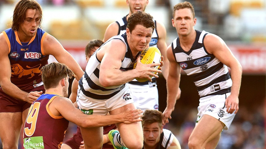 Patrick Dangerfield emerges from a pack