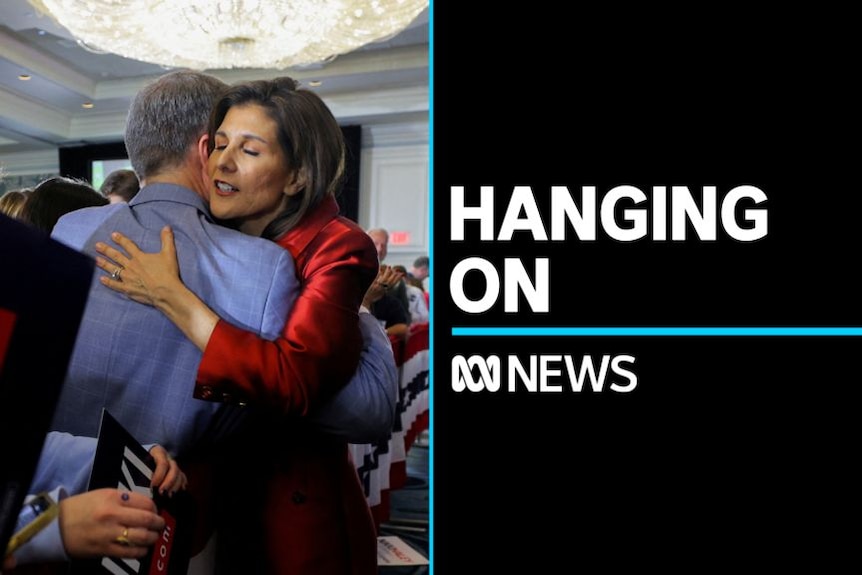 Hanging On: Nikki Haley embraces a supporter at a campaign rally