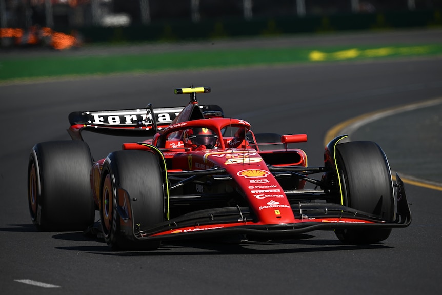 Carlos Sainz driving his Ferrari F1 car in Melbourne during a race