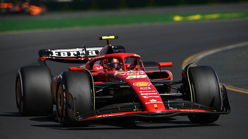Carlos Sainz driving his Ferrari F1 car in Melbourne during a race