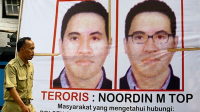 Wanted no more: police poster of terror mastermind Noordin Mohamad Top