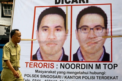 Wanted no more: police poster of terror mastermind Noordin Mohamad Top