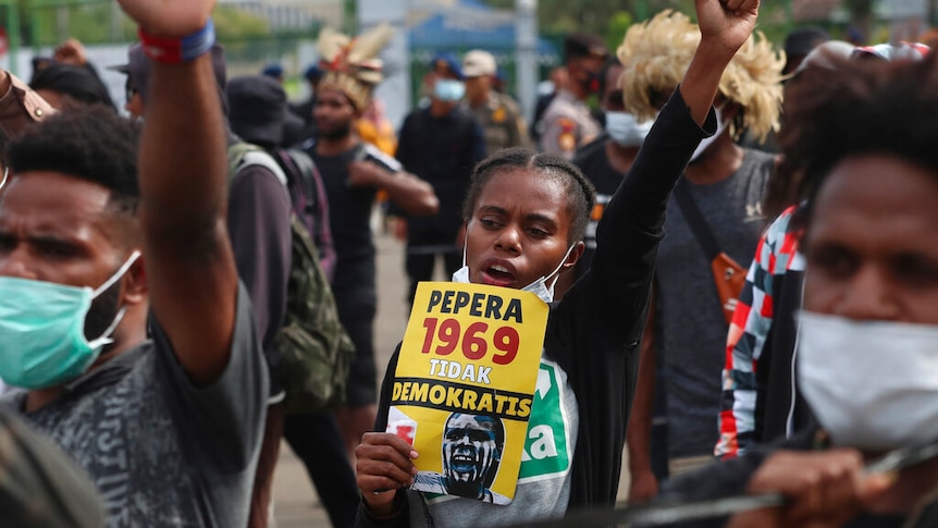 Supporters of the independence of the West Papua shout slogans during a rally.