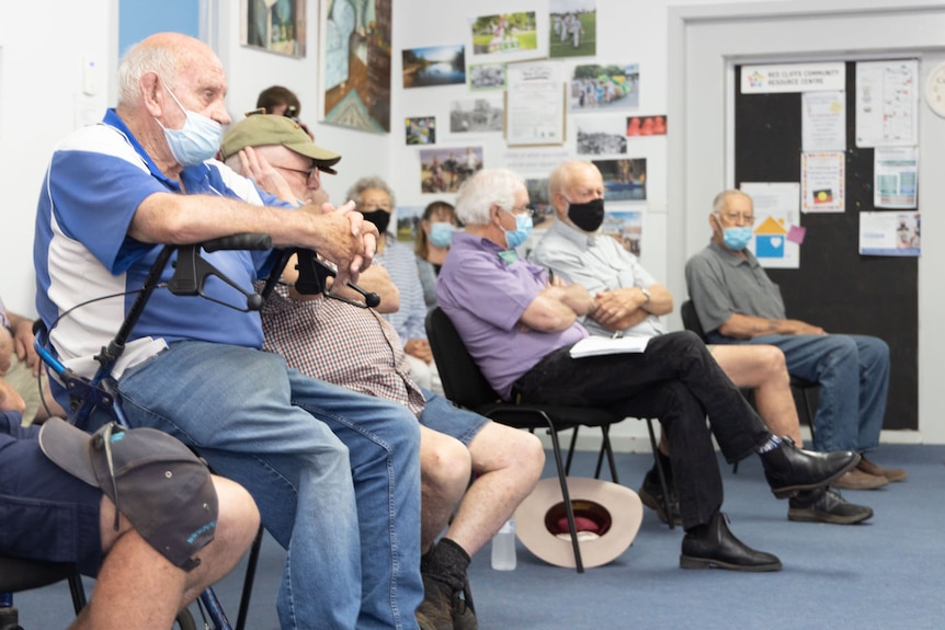 People sitting in a room.