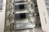 A box containing five influenza vaccines.