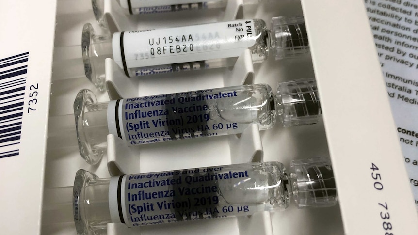 A box containing five influenza vaccines.