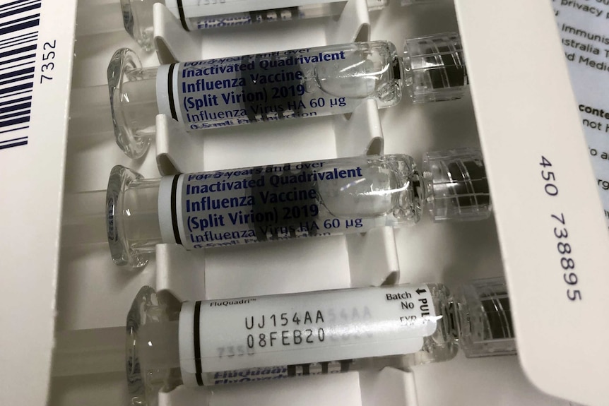 A box containing five influenza vaccines.