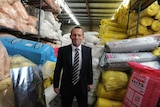 Tony Abbott visits a home insulation batts factory