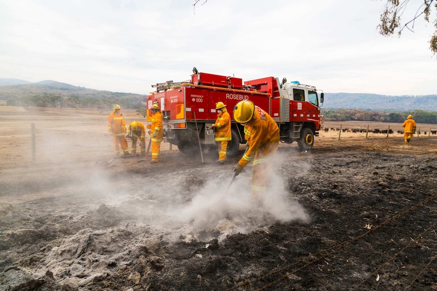 CFA crews cool and turn over the hot earth.